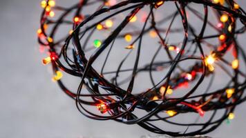 a string with orange and green lights on it, photo