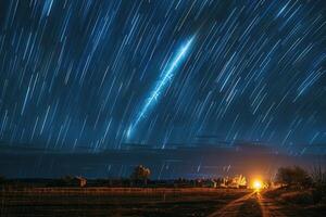 a night time photo with various lights in the sky,