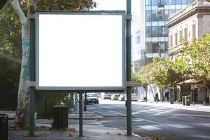a billboard on a city street in front of buildings, photo