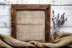 an empty framed picture with lavenders and canvas draped underneath, photo