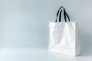 white shopping bag hanging on the wall, photo