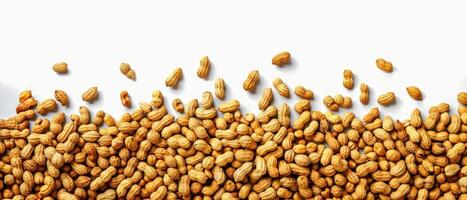 the peanuts are piled on top of each other, photo