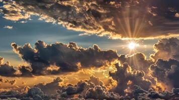 the sun is setting through dark, puffy clouds, photo