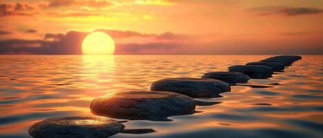 a row of stepping stones on the ocean at sunset, photo