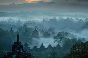 the top of a mountain with fog around it, photo
