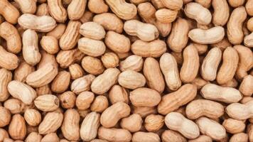many peanuts are piled together to make a very beautiful background, photo