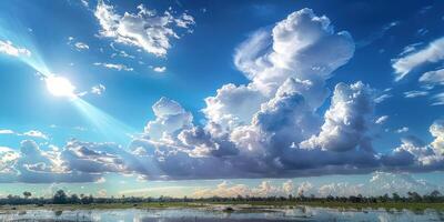 the sun is shining through clouds over some water, photo
