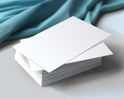 many folded business cards sit in a pile, photo