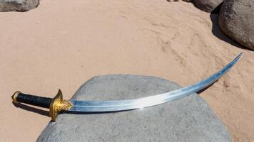 a sword rest on the sand of a beach, photo