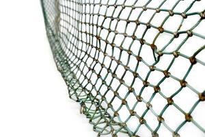 a tennis court covered with green net material, photo