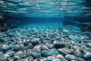the under water is filled with rocks and gravel, photo