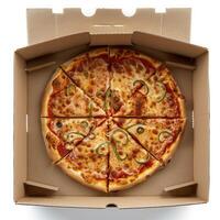 sliced pizza in box with green toppings, photo