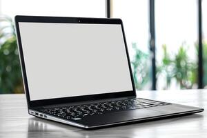 the open acent laptop is sitting on the table, photo