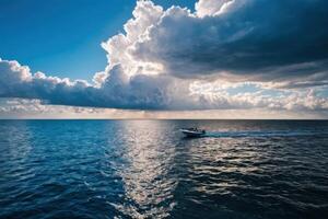the sky is a big cloud over a boat, photo