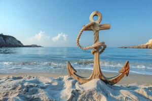 an anchor and rope on the beach, photo