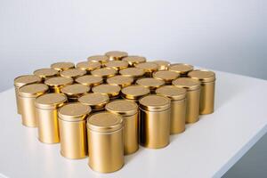 large round gold containers stacked on top of it, photo