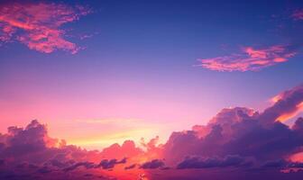 the sky is pink and yellow with clouds, photo