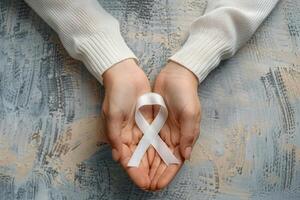 a person with a white ribbon in their hands, photo