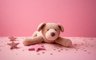 the stuffed animal lies on the floor where stars dot all around, photo