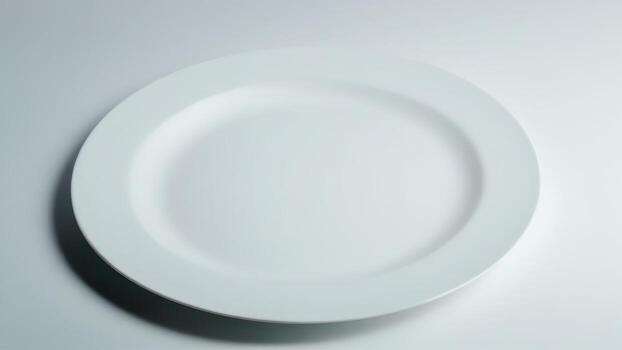 an empty white plate on top of a white counter, photo