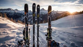 two skis with poles sticking out of the snow, photo