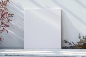 a blank poster is propped against the wall, photo