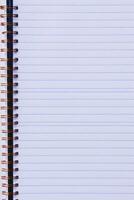 a picture of the back side of a spiral notebook, photo