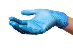 an open hand with blue surgical gloves on, photo