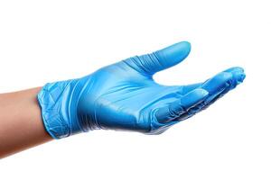 hands in sterile gloves are holding up an object, photo