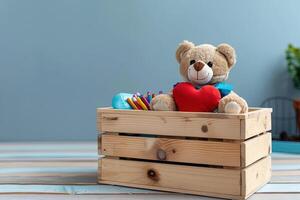 a toy teddy bear sitting inside of wooden boxes, photo