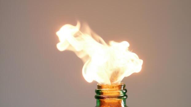 a bottle is on fire with one light up, photo