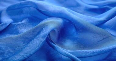 blue fabric with paisley patterns on it, photo