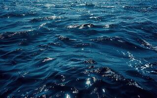 an ocean view as seen from the back on a small boat, photo