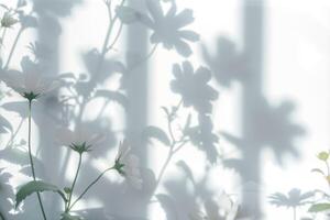 small white flowers in a blue vase on the table, photo