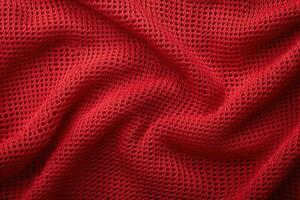a red knitted blanket with an unlined square pattern, photo