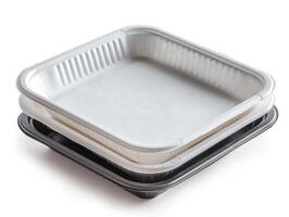 one black and another white empty tray in it, photo