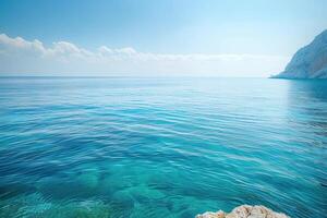 the ocean is serene and empty from its sun, photo