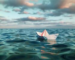 paper boat floating in calm water in ocean, photo