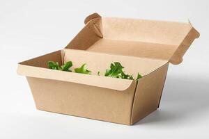 some lettuce is in a brown box, photo