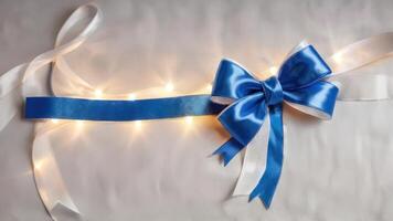 a light strip with white and deep blue bow on it, photo
