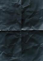 two black paper with torn edges and darker colors on them, photo