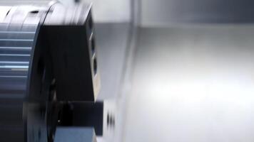 Rotating turning chuck. Media.A special device for fixing parts or tools that rotates around its axis at a fast speed. video