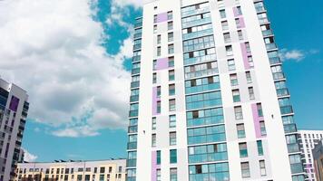 Top view of stylish architecture of modern district. Stock footage. Modern architecture of new residential buildings. Well-maintained residential area with multi-storey new houses video
