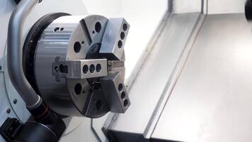 Rotating turning chuck. Media.A special device for fixing parts or tools that rotates around its axis at a fast speed. video
