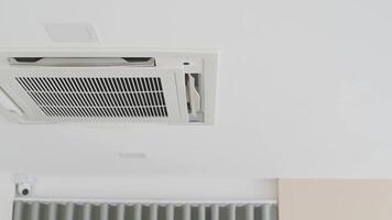 Ceiling mounted air conditioning cassette type unit with modern design and sleek appearance video