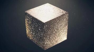 The magical transformation of a cube into a whirlwind of glittering dust then back again.. video