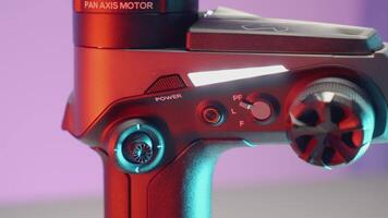 JAPAN, TOKYO - MARCH 21, 2022. Part of the stabilizer is turned over by hand. ACTION. The stabilizer is shown rotating along the axis. On a purple background, a part of the stabilizer is removed for video