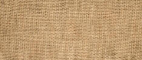 Natural Burlap Texture Background with Beige and Brown Flecks, Office Desk Concept with Copy Space photo