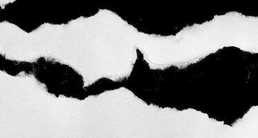 Torn Paper on Black Background with Space for Text photo