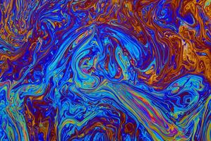 Abstract Light Patterns on Soap Bubble Surface photo